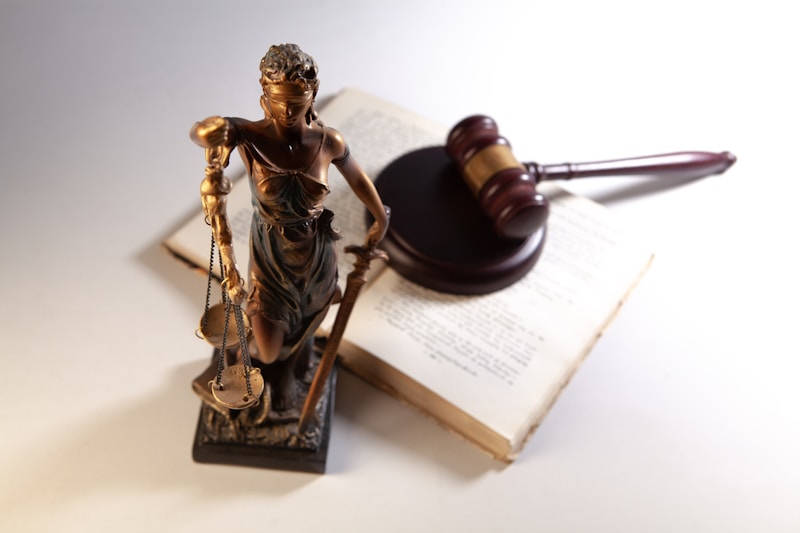Justice scales, gavel, and open law book
